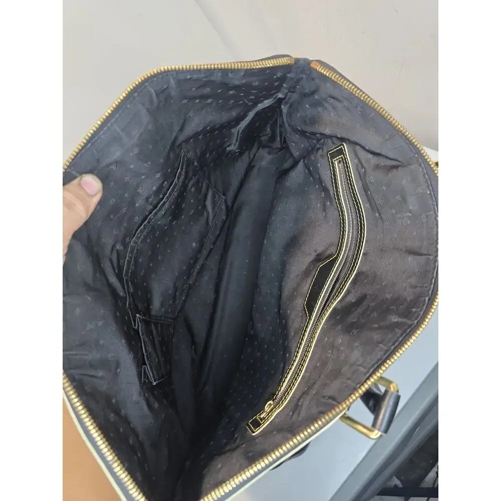 Black leather Louis Vuitton locKit bag